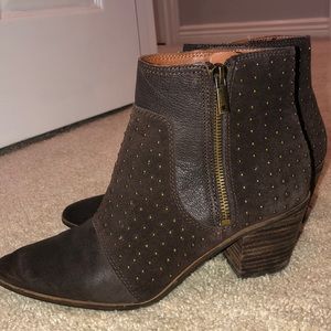 Women’s dark brown bootie boots with gold stud accents